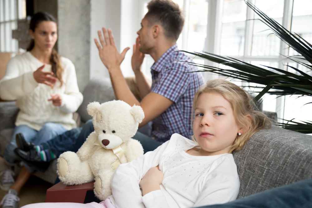 little upset girl daughter depressed with parents arguments divorce 11zon