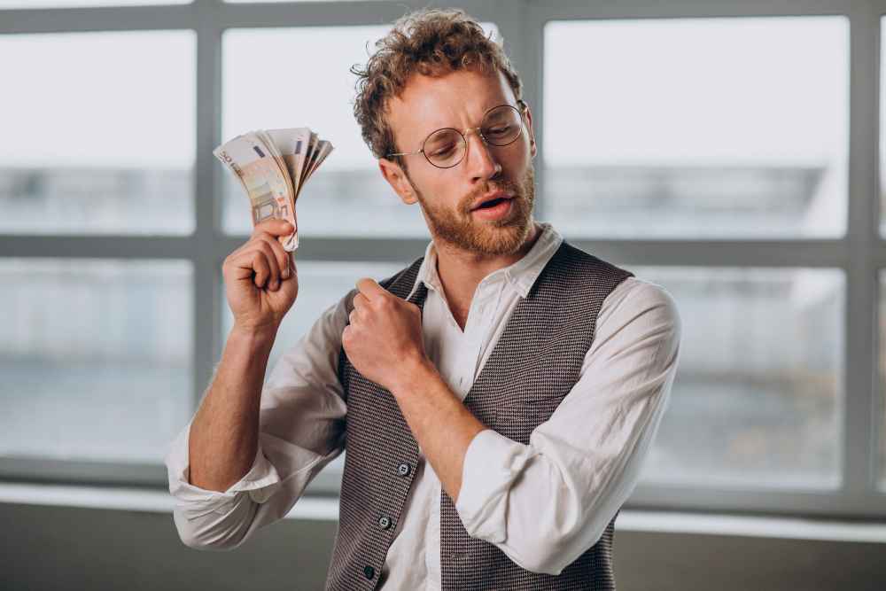 man with banknotes isolated studio 11zon
