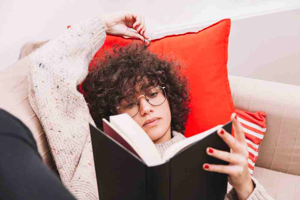 teenager reading sofa 11zon