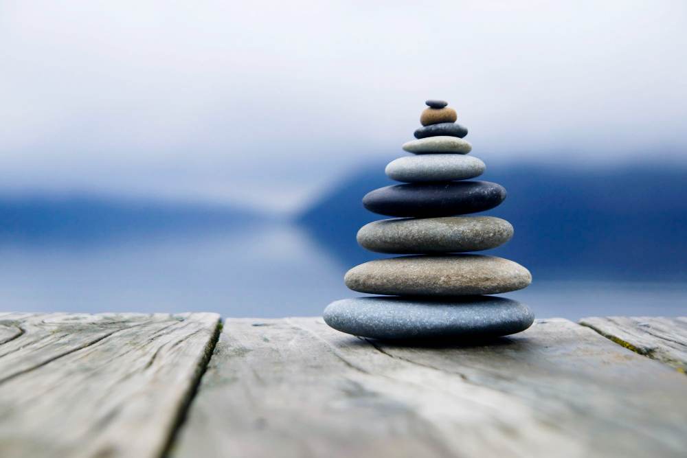 zen balancing pebbles misty lake 11zon